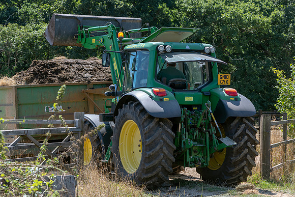 John Deere 6430 Tractor with JD633 Loader.