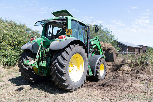 John Deere 6430 Tractor with JD633 Loader.