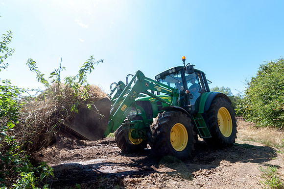 John Deere 6430 Tractor with JD633 Loader.