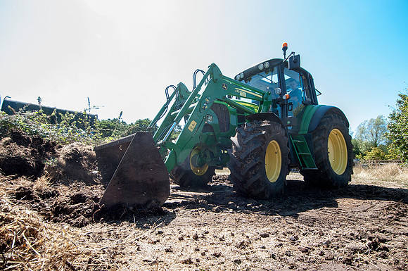 John Deere 6430 Tractor with JD633 Loader.